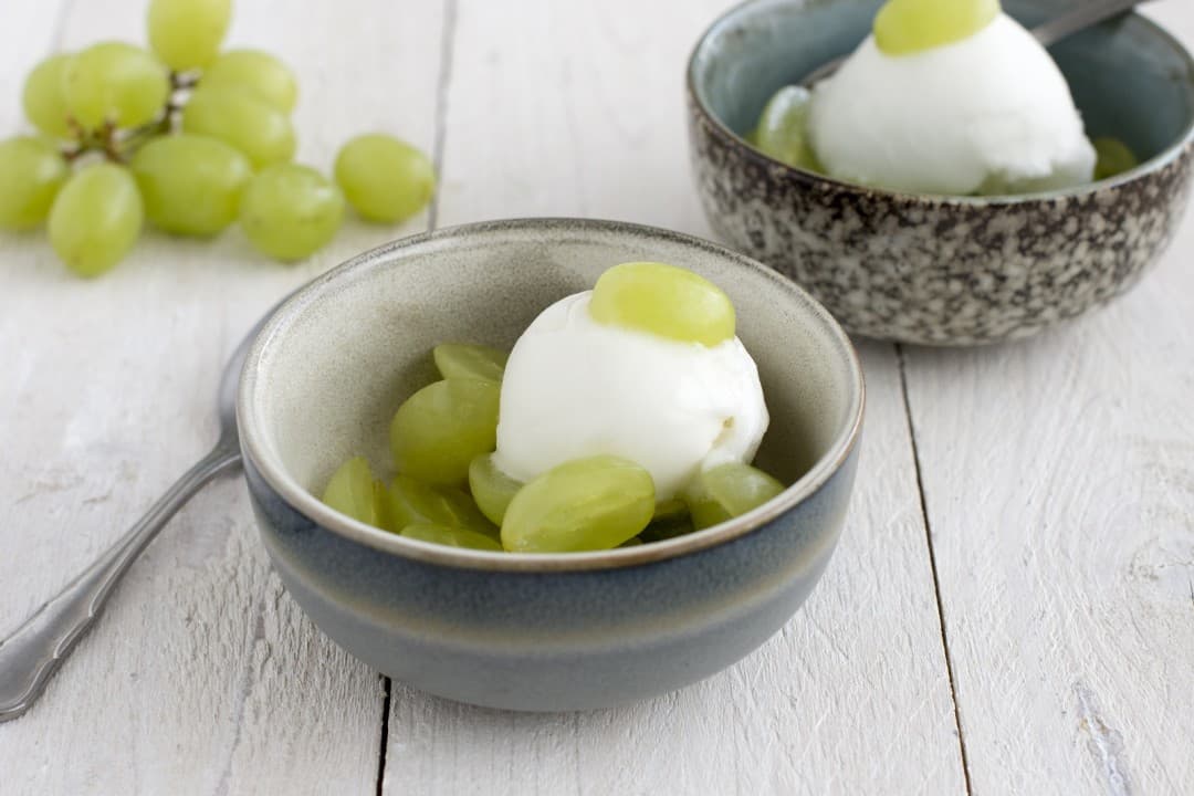 Lemon ice cream with cinnamon grapes