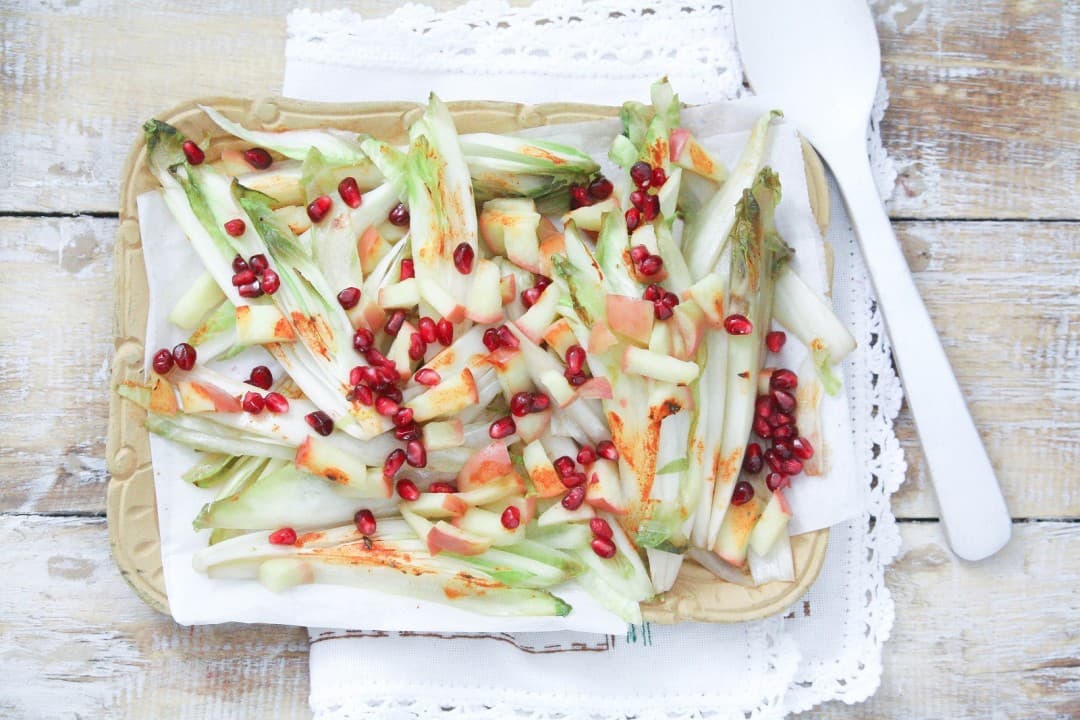 Stir-fried chicory with pomegranate