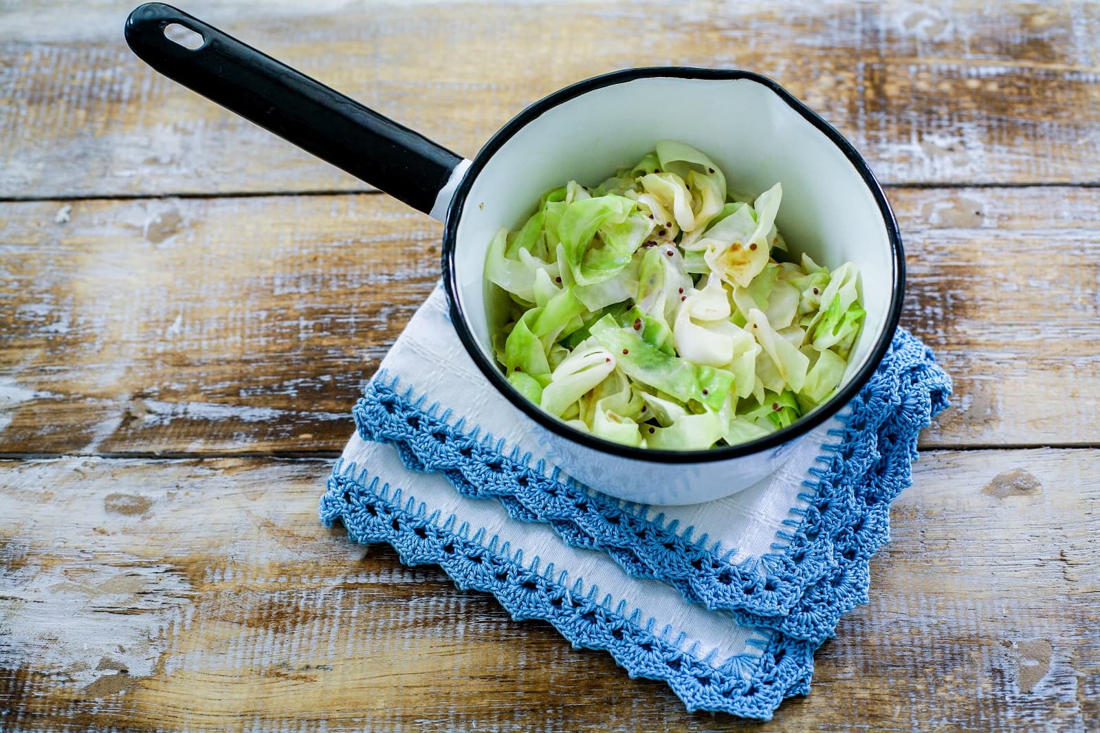 Green cabbage with mustard and cream