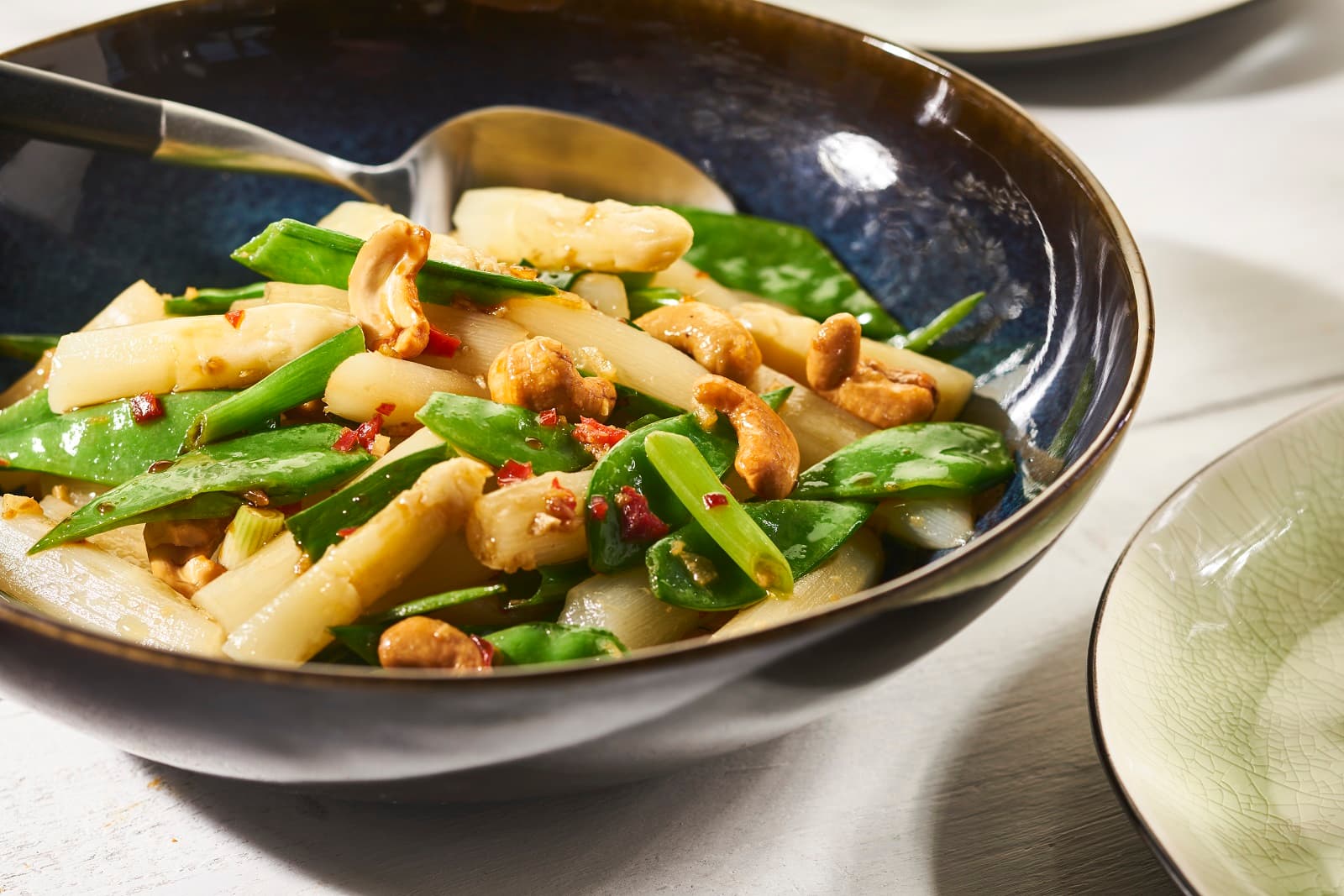 Oriental stir-fried asparagus with snow peas