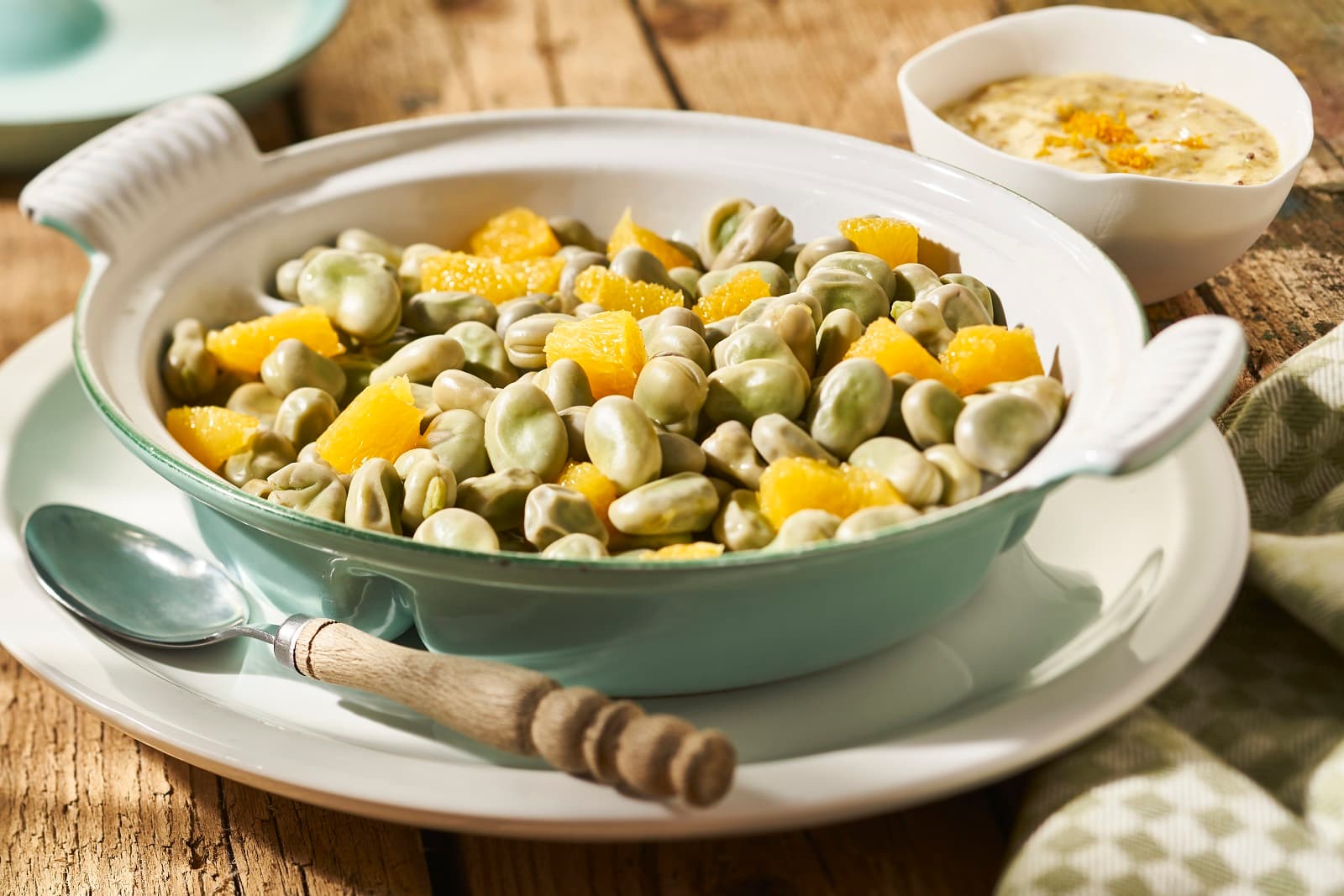 Broad beans with orange mustard sauce
