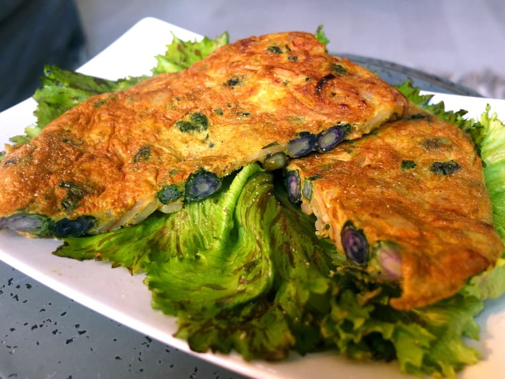Tortilla Violeta with purple sprouts