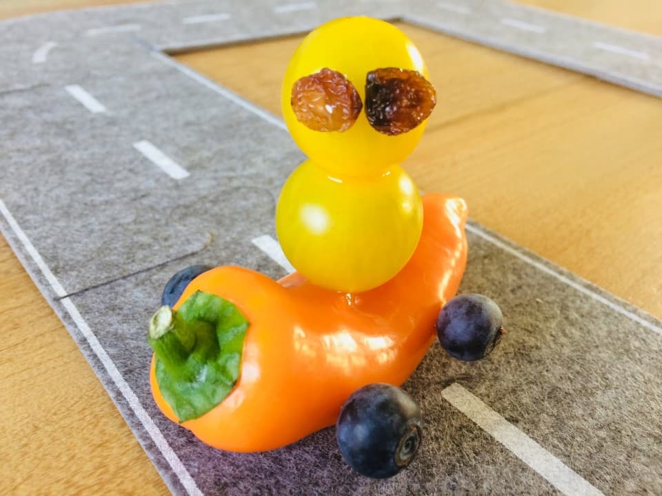 Car with driver treat with fruit and vegetables